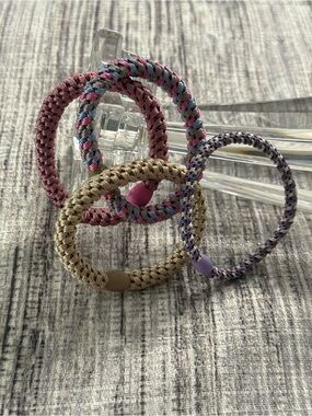 Authentic original KKNEKKI
hair ties. Set of 4 (1 slim and 3 regular)